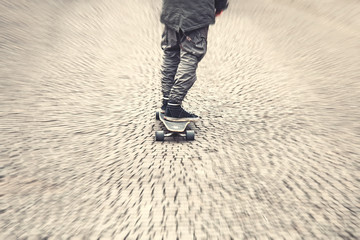 Urban faster skater on gray