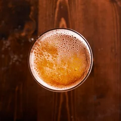 Fotobehang glass of beer shot top down © Joshua Resnick