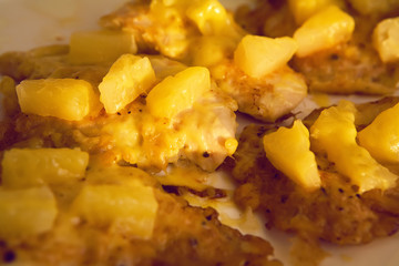 Appetizing chop from chicken with cheese and pineapples