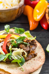 close view on mexina tacos with beef and vegetables