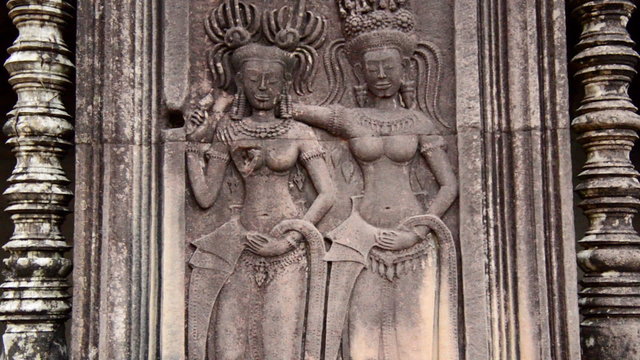 Zoom out-  Stone Carving of Religious Icons on Temple Wall - Angkor Wat, Cambodia