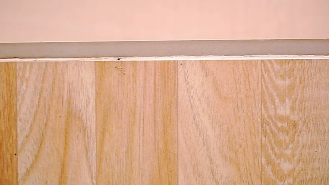 Close up of oak parquet Of beige color. Macroo video shift