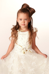 Portrait of cute little girl in princess dress