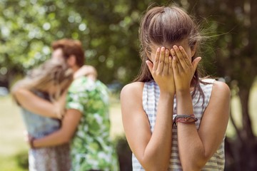 Brunette upset at seeing boyfriend with other girl