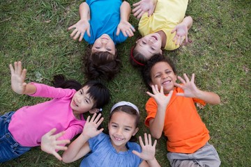 Fototapeta premium Little children having fun in park