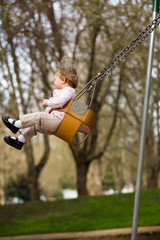 One Year Old on Swings