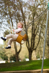 One Year Old on Swings