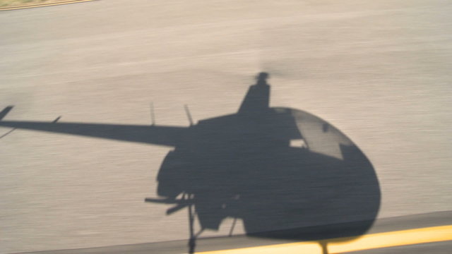 Shadow of Helicopter talking off.  