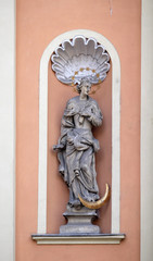 Fototapeta na wymiar Virgin Mary, portal of Holy Trinity church in Graz, Austria