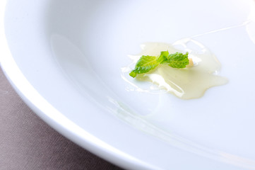 honey mint on white plate with place for text