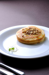 pancakes on white plate