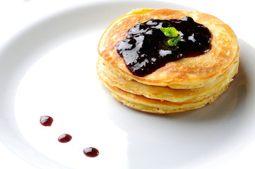 pancakes on a white plate