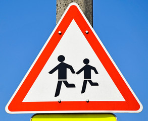 Road sign at the pedestrian crossing