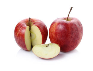 Fototapeta na wymiar Fresh red apple with leaf and slice on a white background