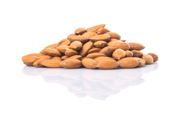 Raw almond nut over white background