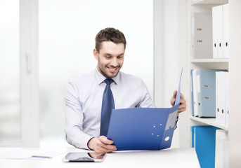 businessman with folder and tablet pc computer