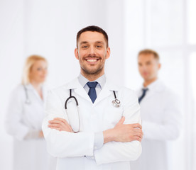 smiling male doctor with stethoscope