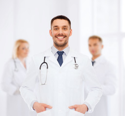 smiling male doctor with stethoscope