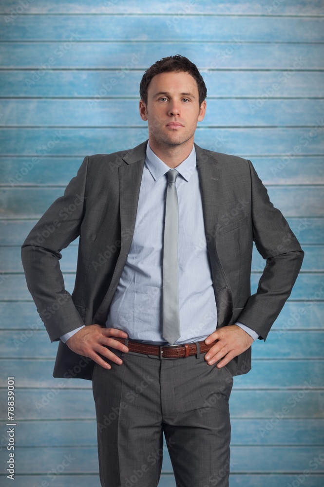 Poster composite image of serious businessman with hands on hips