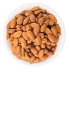 Raw almond nut in a white bowl over white background