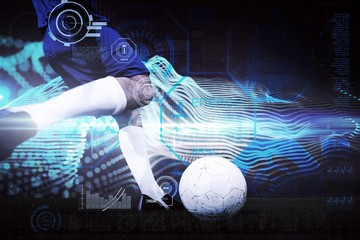 Composite image of football player kicking ball