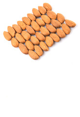 Raw almond nut over white background
