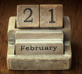 A very old wooden vintage calendar showing the date 21st Februar