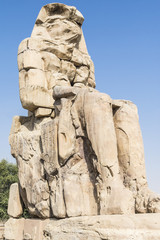Fototapeta na wymiar Colossus of Memnon, statue of Pharaoh Amenhotep III, Luxor