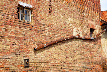 Brick wall of an old ruined building