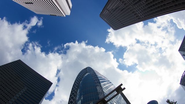 Shinjuku buildings and white cloud time lapse