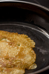 crepe baking in pan