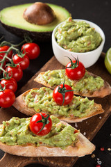 Guacamole with bread and avocado