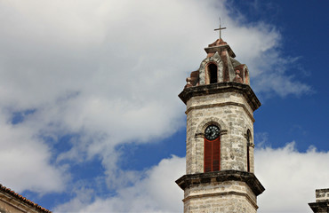 Stone cathedral tower in Havana square