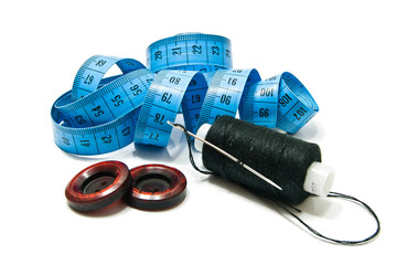 spool of thread, buttons and meter
