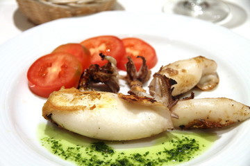 Roasted squid on plate
