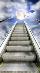 The escalator is moving up to the starry sky with a  moon