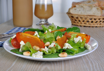Light salad with persimmon