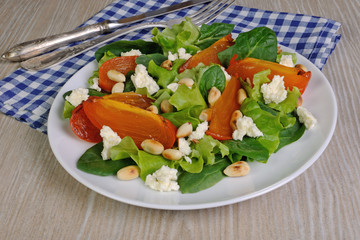 Light salad with persimmon