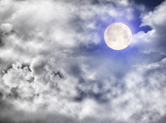 Naklejka na ściany i meble Full moon in sidereal cloudy sky
