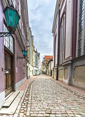 Narrow medieval street in old Riga city, Latvia, Europe