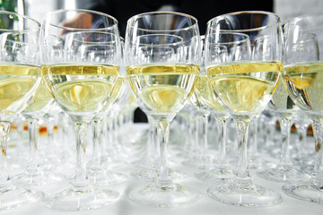 glasses with wine in row