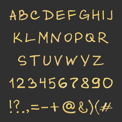 Handwritten gold alphabet
