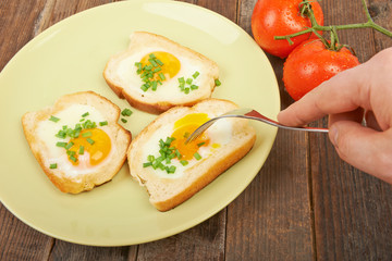 Fried eggs in a plate on the table