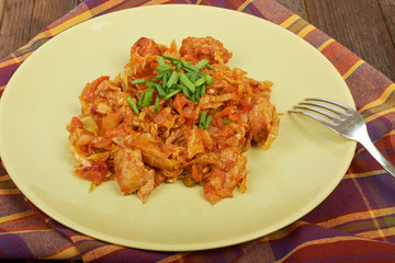 Lunch cooked meat with vegetables and spices