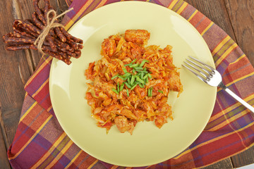 Lunch cooked meat with vegetables and spices