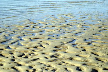 textured pattern on a sandy beach