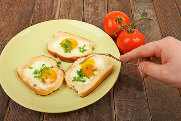 Fried eggs in a plate on the table