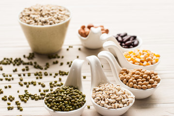 collection set of beans, legumes, peas, lentils on ceramic spoon