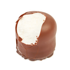 Delicate dessert souffle with chocolate in hand isolated