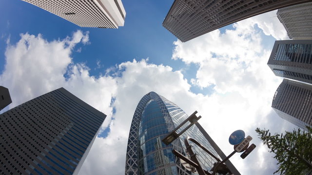 Shinjuku buildings and white cloud time lapse